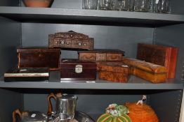 An assorted collection of carved wood table and jewellery boxes, to include an Edwardian mahogany