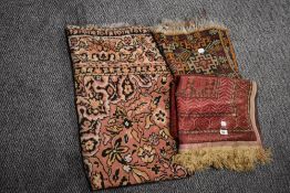 Three traditional North West Persian design rugs, two being machine loomed.