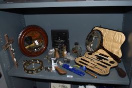 A miscellany of items, to include; vintage manicure set, whistles, opera glasses, lighters, mirror