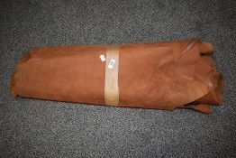Several pieces of tan leather, for crafts and projects etc.