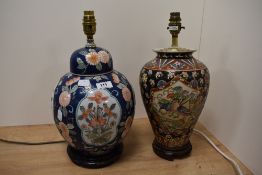 Two table lamps of oriental design, one in the form of a ginger jar, both sat on wood plinths.