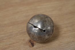 A Victorian silver collar bell, measuring 4cm high