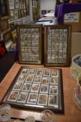 Three framed, glazed and mounted sets of Players cigarette cards.