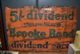 A vintage enamel sign ' 5/-Dividend when you fill up Brooke Bond dividend card '.