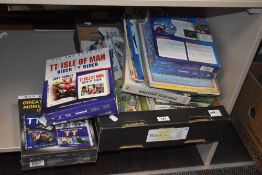 A selection of TT racing DVD and books sets, Starsky and Hutch magazines and various Giles books.