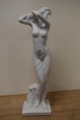 An alabaster style figure, classically styled nude maiden.