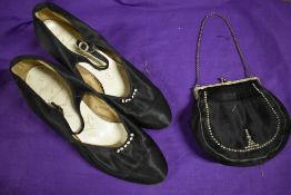 A 1920s silk handbag with diamante detail and a pair of 1920s black satin dance shoes with