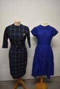 Two vintage dresses, to include late 1950s / early 1960s tartan wiggle dress with belt and 1950s
