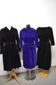 Three vintage velvet dresses, including dramatic 1940s black dress with stitched detail to bodice
