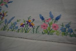 Three beautifully detailed vintage table cloths, including linen with cut work and embroidery and