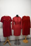 Three 1960s red dresses, including two of red velvet.