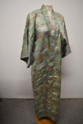 A vintage oriental dressing gown, void of belt.