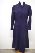 An Art Deco navy blue wool day dress, having self covered buttons to front.