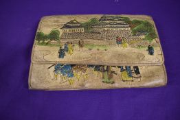 A vintage 1940s hand painted Japanese goat leather clutch bag.