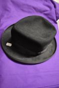 A vintage trilby, having label for Sutton hat makers, Stockport.