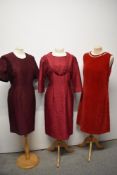 Three 1960s red dresses, including red velvet mini dress, having buttons to back and side zip and