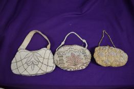 Three vintage beaded evening bags.