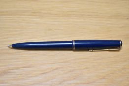 A Parker 17 ballpoint pen in blue with narrow band to the cap