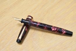 A Parker Televisor Junior button fill fountain in rose marble with single broad band to the cap