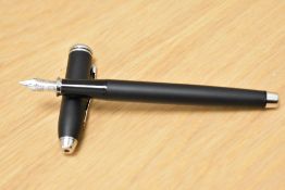 A Cross plunger fill fountain pen in matt black having Cross M nib