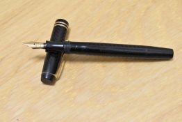 A Parker Ladys button fill fountain pen in black chaised design with two narrow bands to the cap