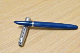 A Parker 51 aero fill fountain pan in turquoise with lustraloy cap. Boxed