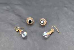 Two pairs of 9ct gold earrings for pierced ears including crystal drops on loop fittings and