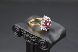 A multi cluster ring having a central diamond surrounded by six oval rubies in petal form within a