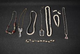 A small selection silver and white metal jewellery, including fancy link set, pendants, collarette