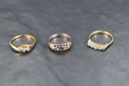 Three 18ct gold rings, each having diamond chip decoration, one also having small sapphires,