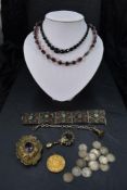A small selection of vintage jewellery including silver three pennies, amethyst set buckle stamped