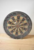 A vintage Supabull dart board