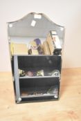 A vintage dressing table mirror, having serpentine shaped top.