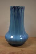 An early 20th Century blue drip glazed vase, of cylindrical squat form, possibly Burmantofts of