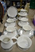 A collection of Royal Doulton 'Juno' cups, saucers, side plates, sugar and jug.