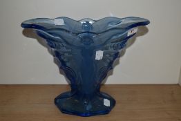An Art Deco frosted blue glass vase, relief moulded with a winged lady, measuring 22cm tall