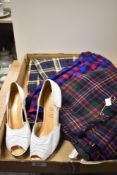 Three ladies, skirts including kilts and a pair of 1980s shoes.