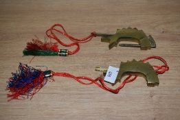 A pair of Chinese brass Koi Carp locks, measuring 12cm long