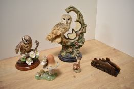 A Border Fine Arts 'Tawny Owl' A1476 from the birds by Russell Willis series, a Border Fine Arts