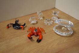 A Pirelli glass crab study, in vibrant orange with black accents, bearing oval label 7.5cm long,