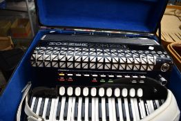 A Hohner VOX5P Midi (atlantic) accordion, with case and accesories