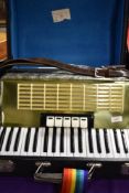 An Eastern European accordion , with hard case