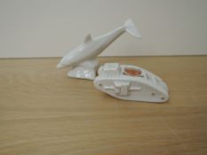An Arcadian China Crested Ware Tank No 658588, Windermere along with a ceramic model of a dolphin