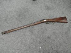 A Single barrel flintlock Sporting Gun, lock plate marked Williams, hexagonal barrel, swivel ram