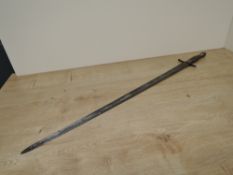 A possible 17th/18th century Small Sword, missing guard, brass grip, pommel and cross guard, blade