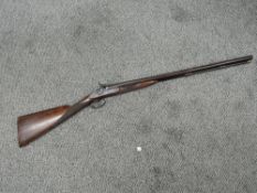 A double barrel percussion Sporting Gun, lock plate marked Cappella Newport, ram rod, chequered