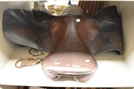 A leather saddle, of traditional design