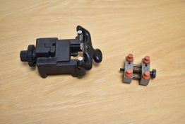 An adjustable Swiss made watch case holder together with an adjustable watch back removing tool