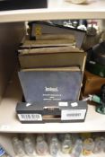 A collection of vintage automobile and motoring related books and guides, to include Leyland