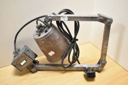 A vintage Memlite steel industrial machinists angle-poise lamp, desk mounted not freestanding,